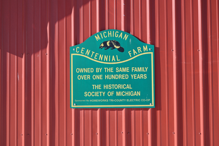 A Historical Society of Michigan plaque located outside the barn at Chapin Family Farms.